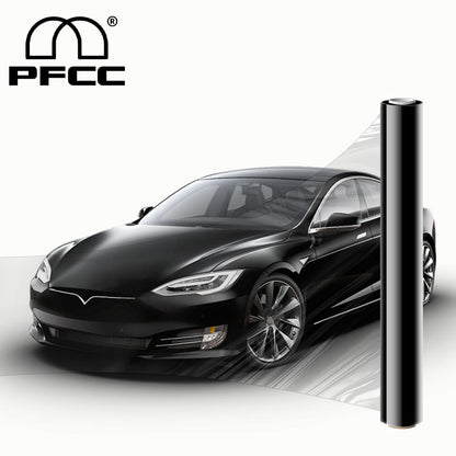 Gloss black TPU paint protection film on luxury sedan